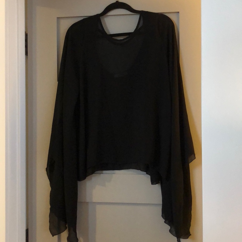 Gorgeous sheer black bell sleeves top.